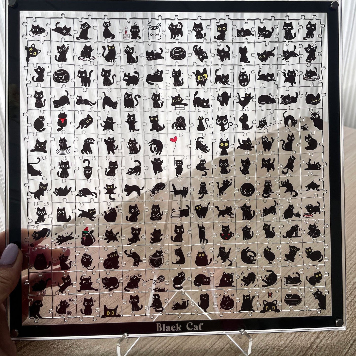 Black, focused, healing acrylic cute cat puzzle with super difficult alien shapes