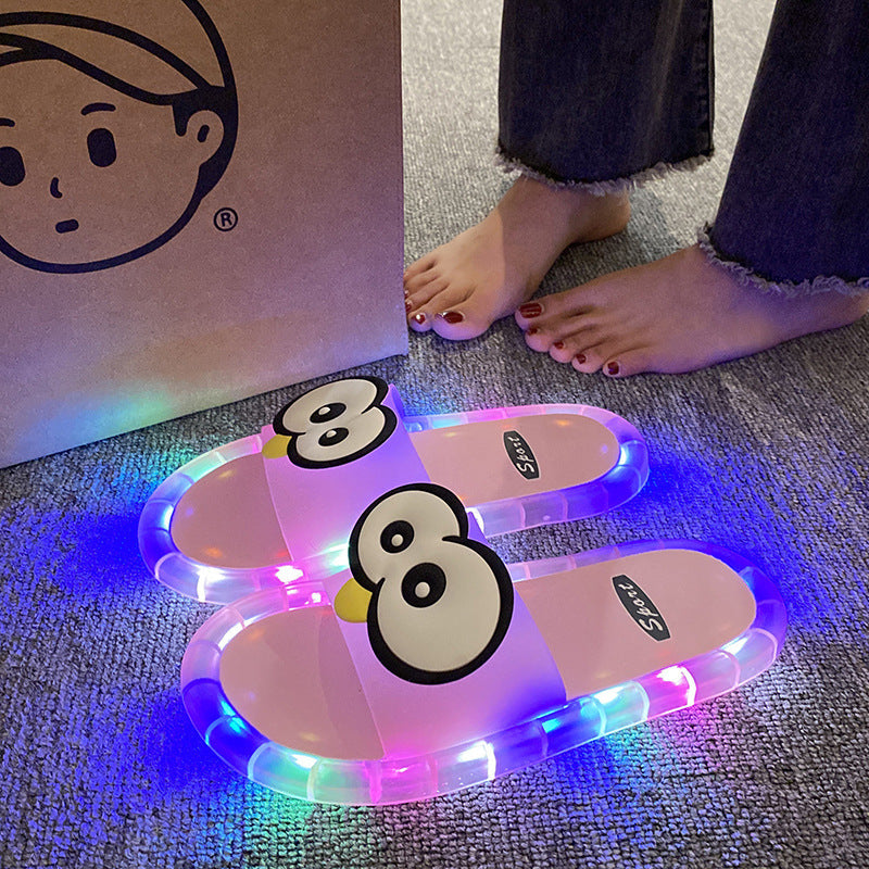 👣Cute slippers with cartoon motifs that glow👣